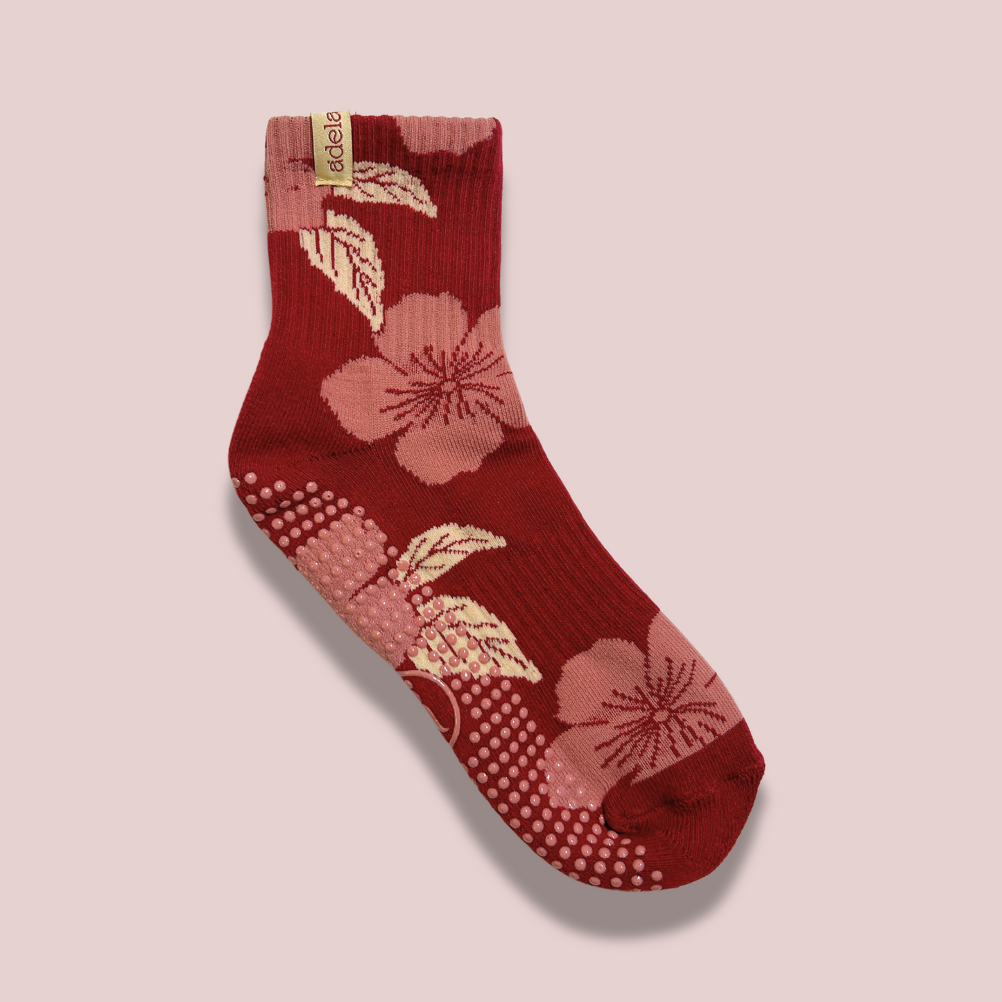 Red and pink hibiscus grip pilates socks